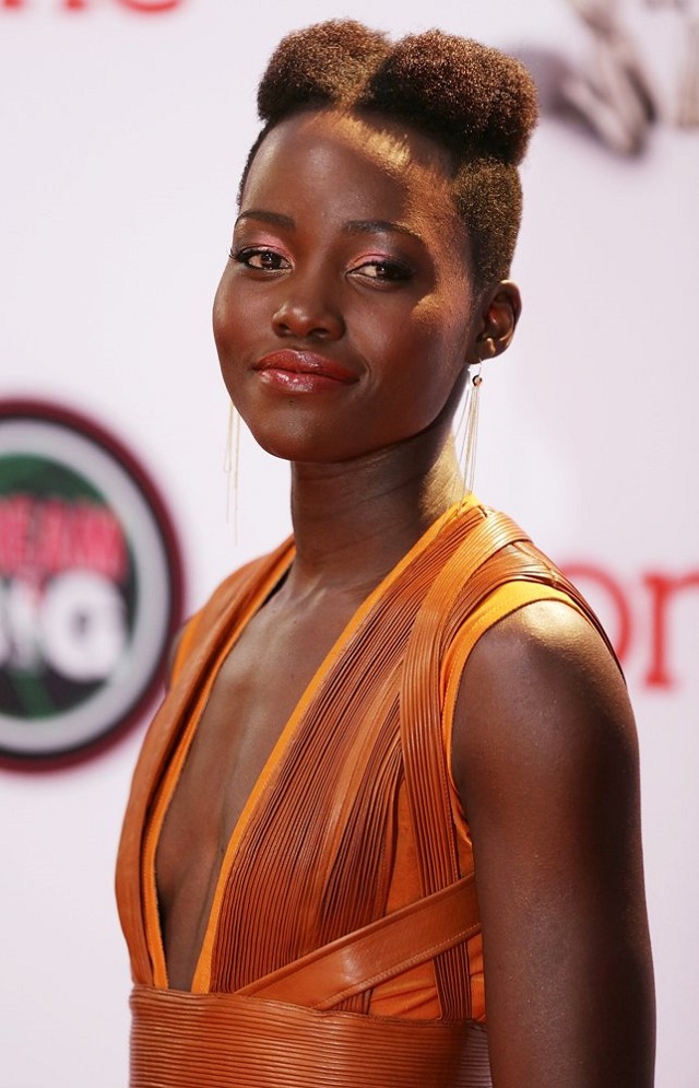 Lupita Nyong’o gorgeous in a copper dress